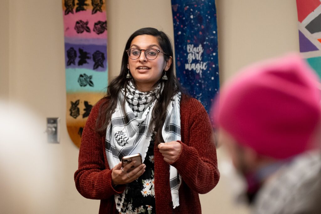 Photo of Sana Saboowala speaking at CU MAC event.